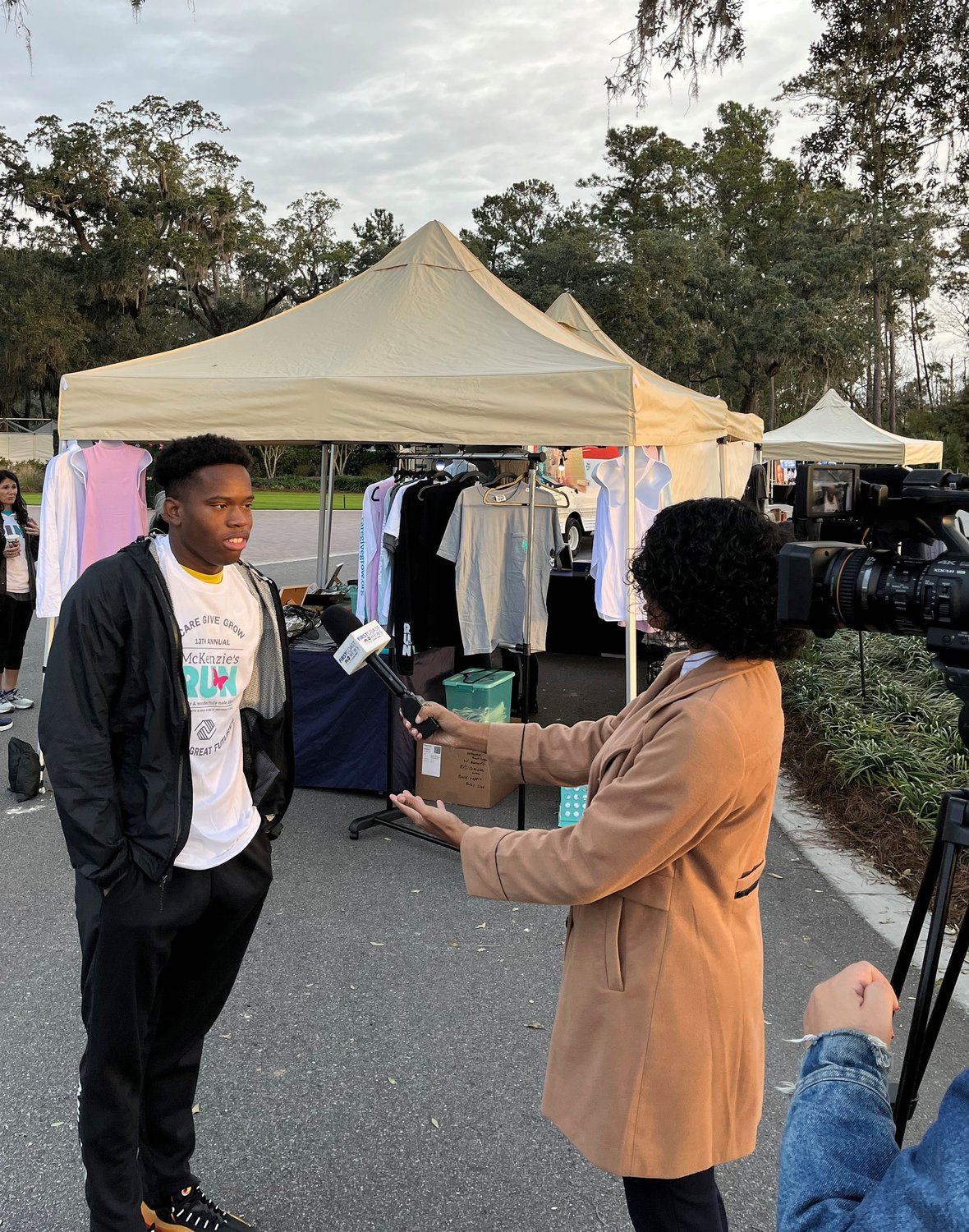 Darius B., a graduating senior and 12-year Boys & Girls Club member, speaks with media about his club experience during the 13th Annual McKenzie’s Run.